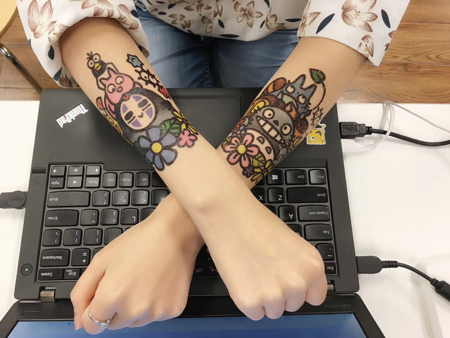 Studio Ghibli temporary tattoos on both arms, 2017